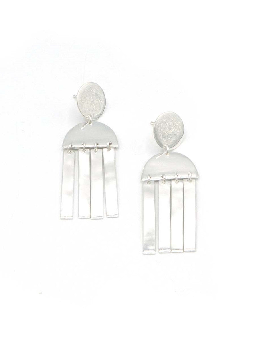 Pair of silver earrings on a white background