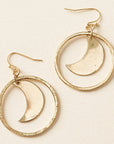 Gold hoop earrings with crescent moon designs on a beige background