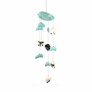 Decorative mobile with cloud and animal shapes on a white background