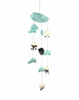 Decorative mobile with cloud and animal shapes on a white background