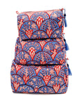 Set of three stacked bags with a blue and red floral pattern on a white background