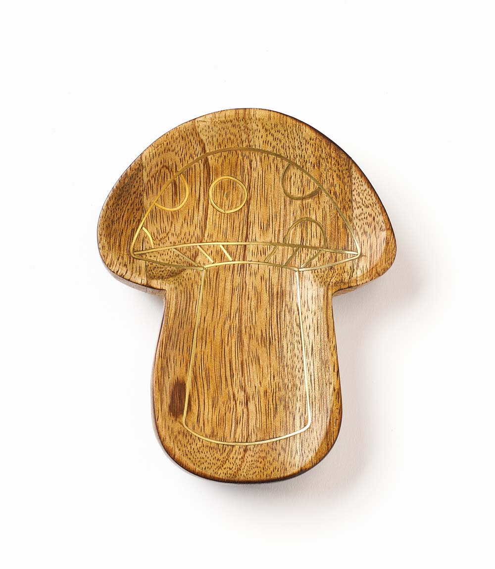 Wooden mushroom-shaped trinket dish on a white background