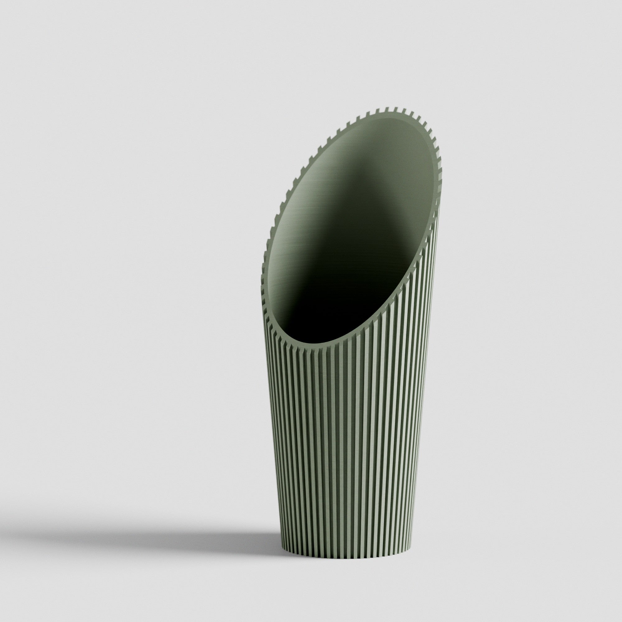 Green soil scoop on a light gray background