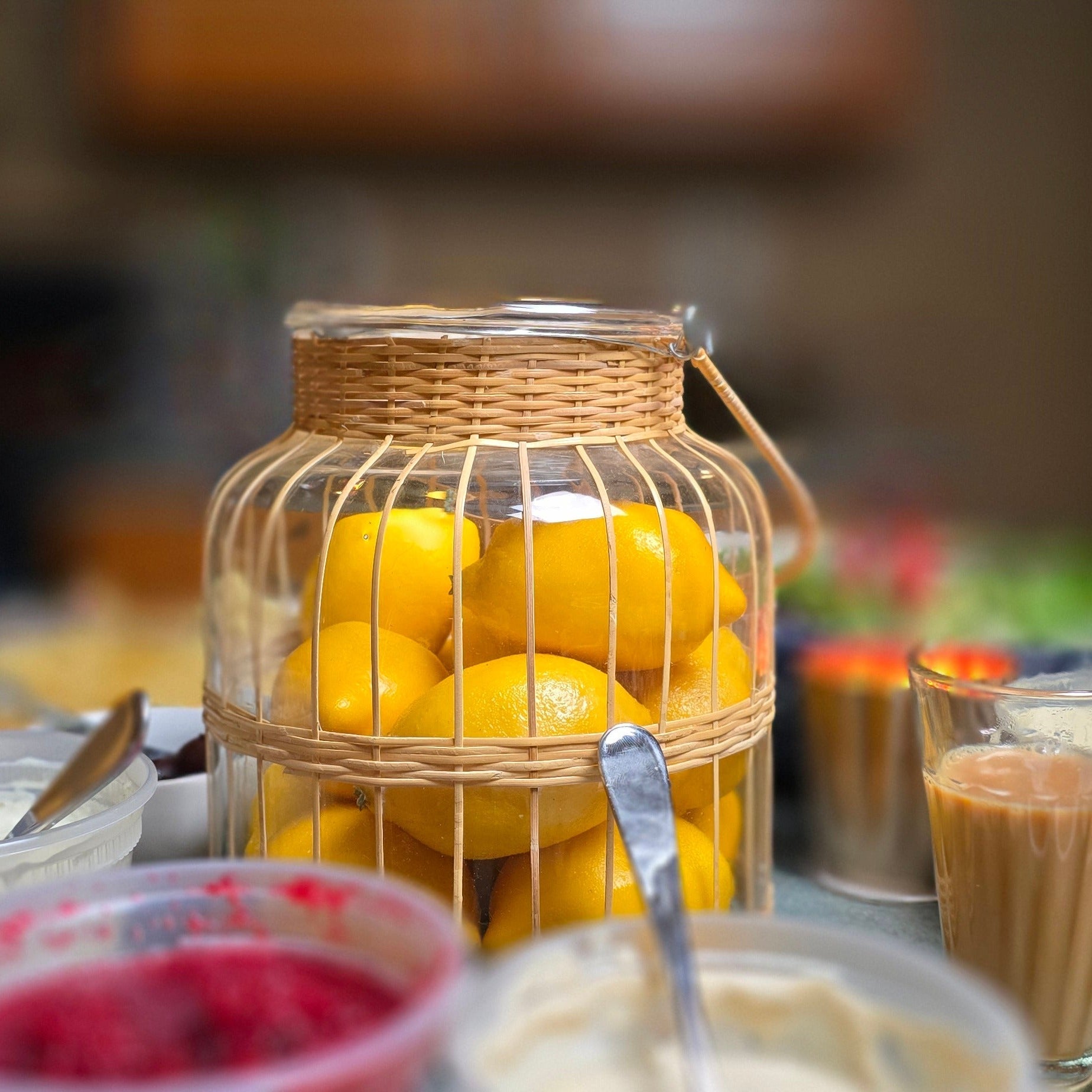 Jar of lemons with a blurred background