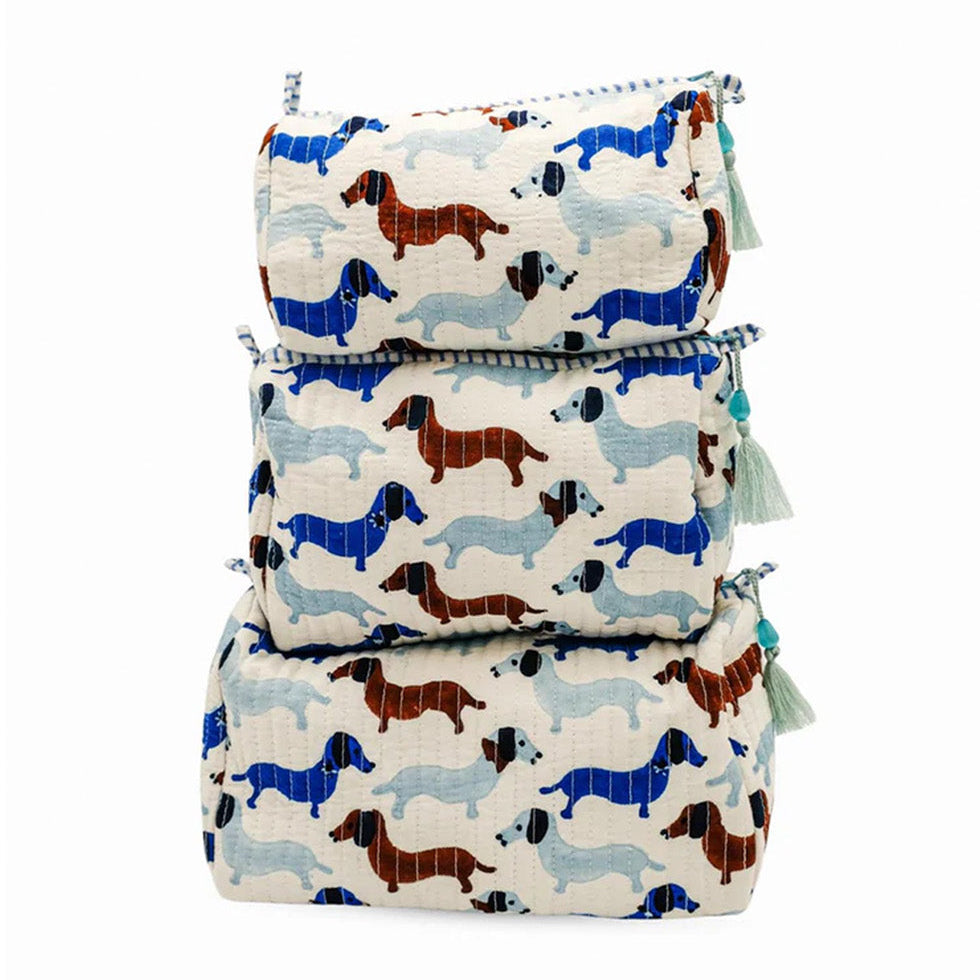 Set of three fabric bags with dachshund pattern on a white background
