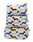 Set of three fabric bags with dachshund pattern on a white background