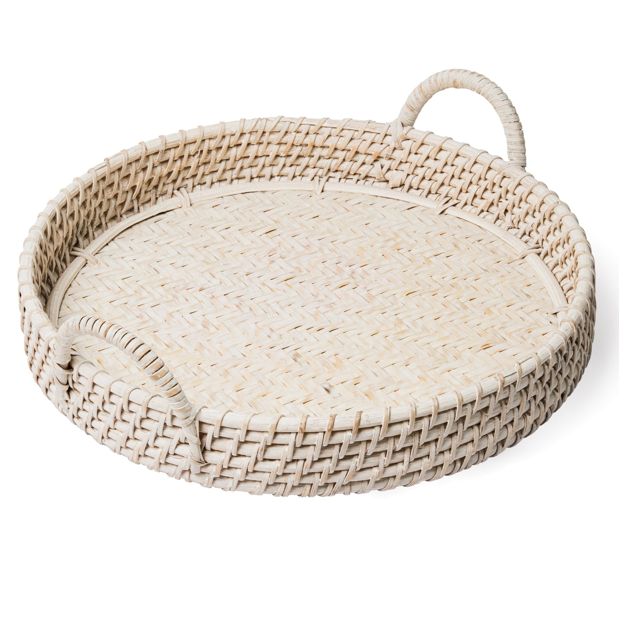Round woven tray with handles on a white background