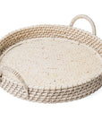 Round woven tray with handles on a white background