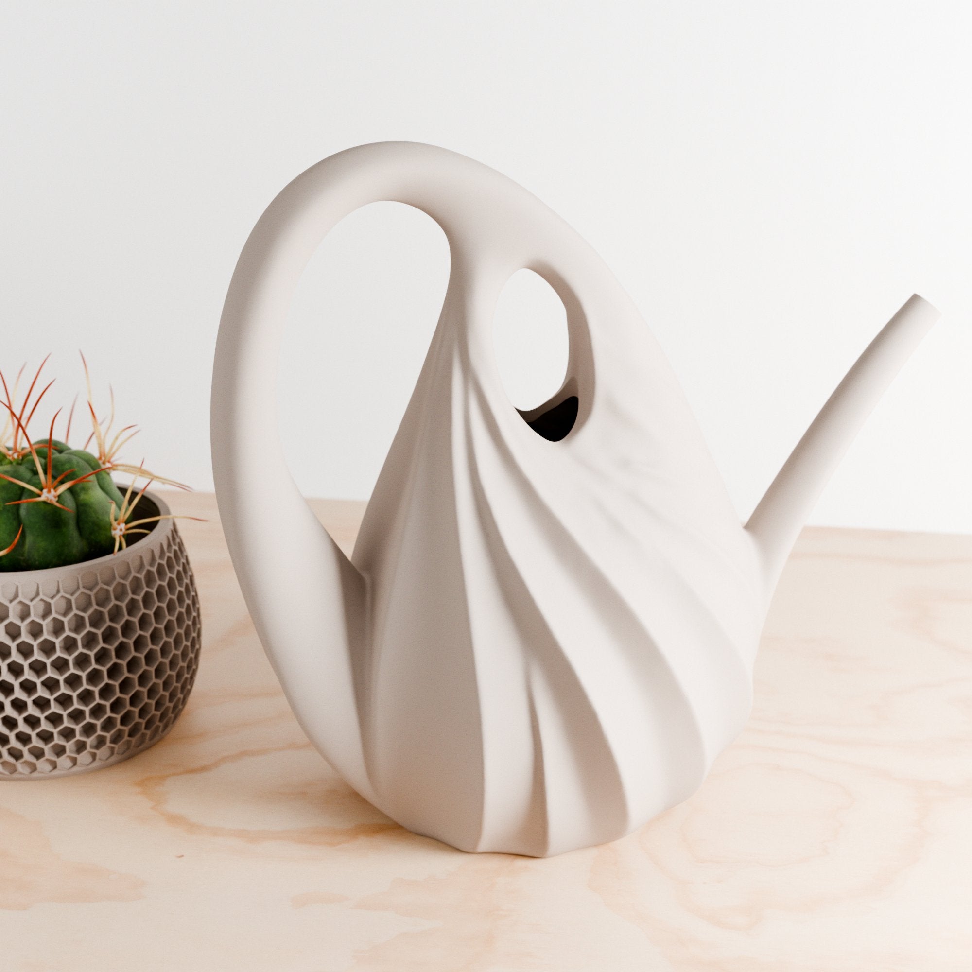 White ceramic swan-shaped vase on a wooden surface with a small potted plant in the background