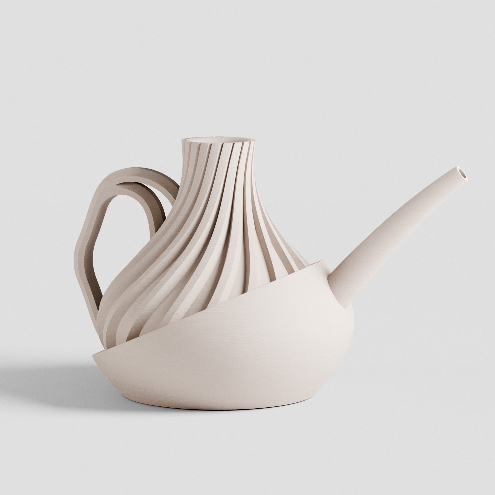 Beige ceramic watering can with wavy design on a light gray background