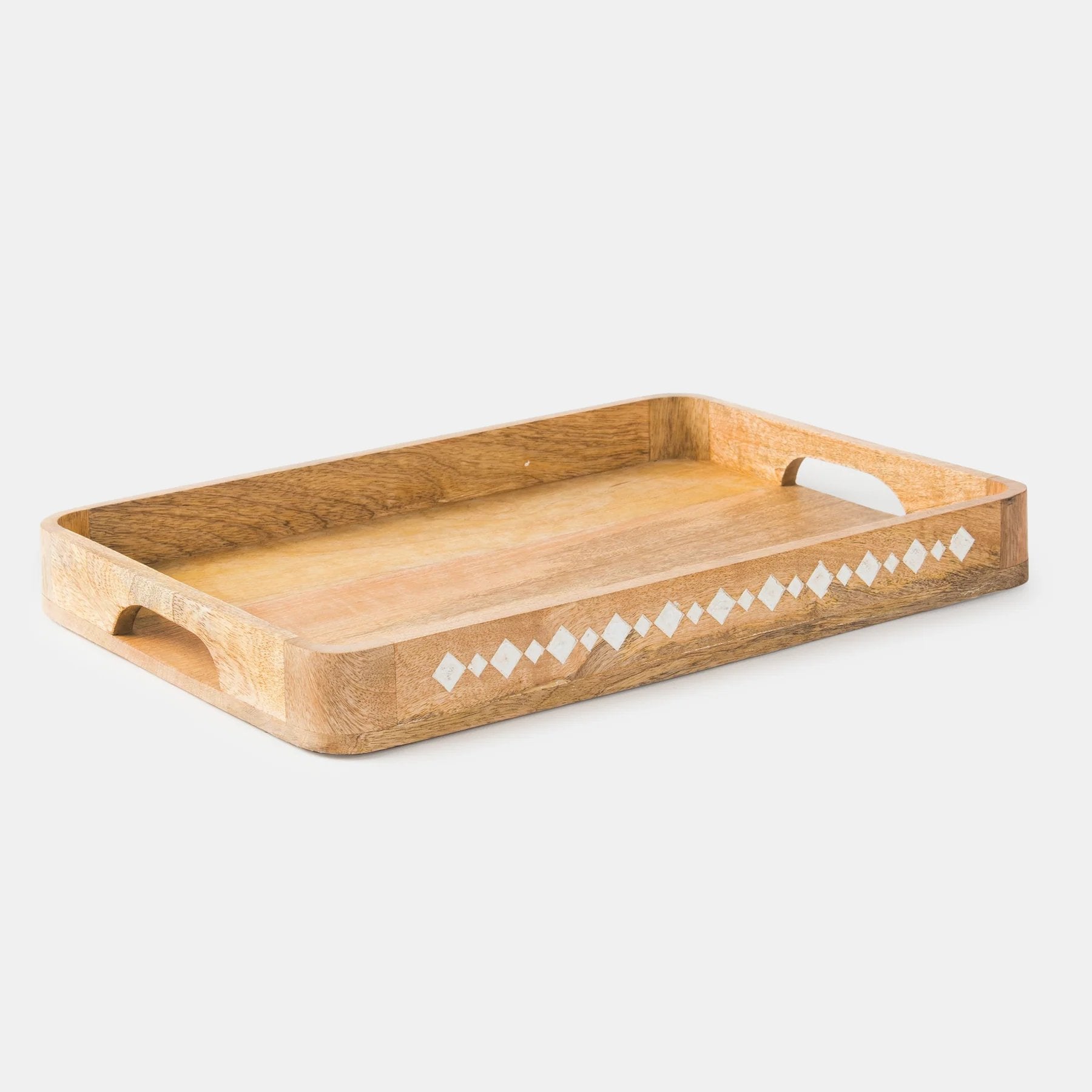 Wooden tray with diamond pattern on a white background