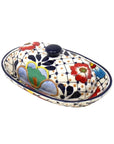 Decorative ceramic butter dish with colorful floral patterns on a white background