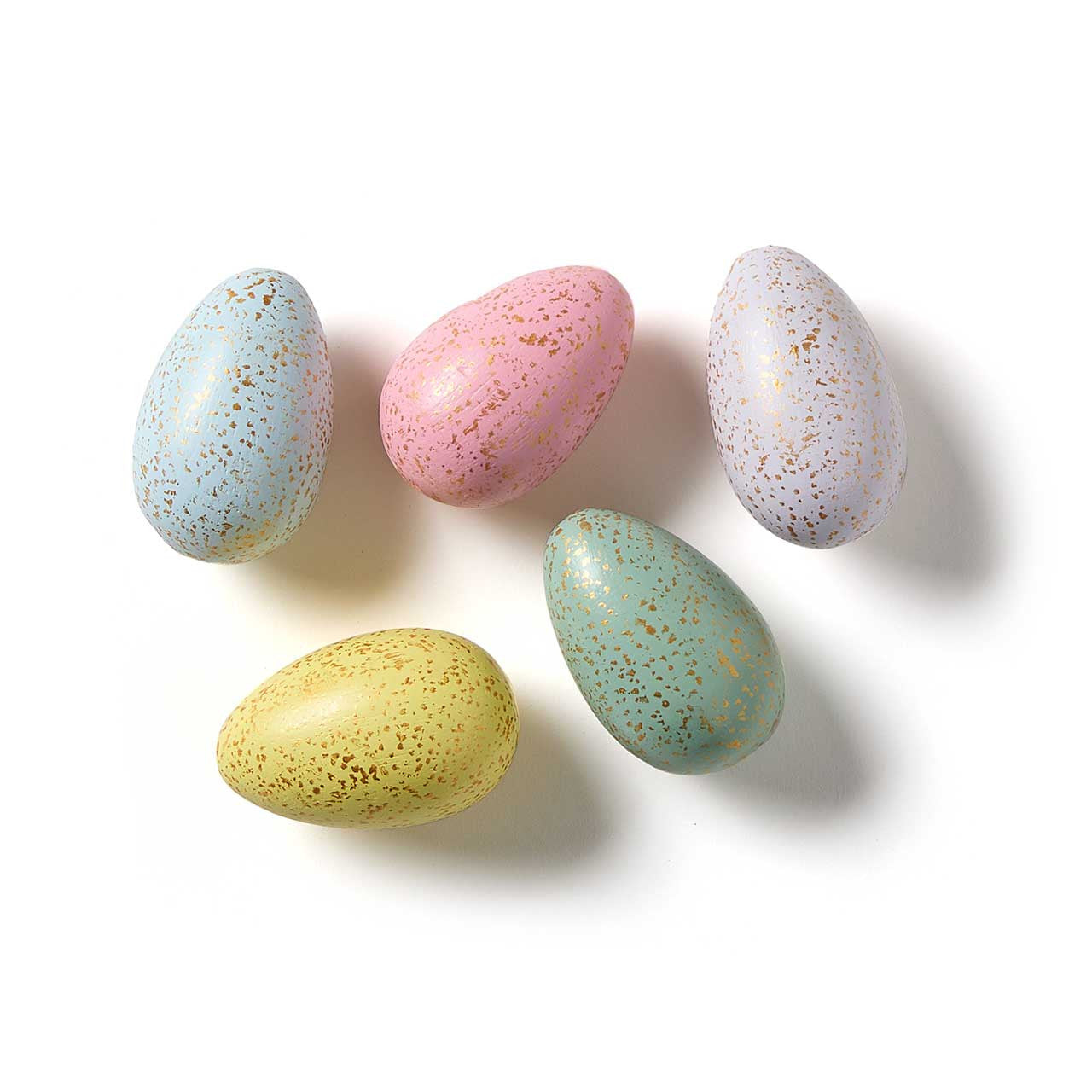 Five speckled Easter eggs in pastel colors on a white background
