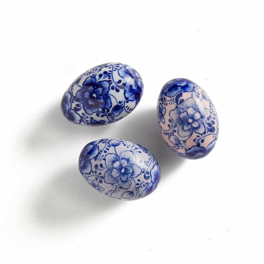 Indigo hand-painted easter eggs with a floral design