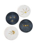 Set of four decorative coasters with celestial designs on a white background