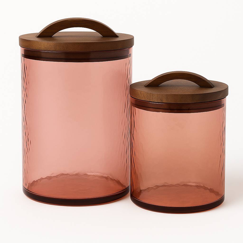 Two glass canisters with wooden lids on a white background