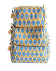 Stack of three patterned bags with tassels on a white background