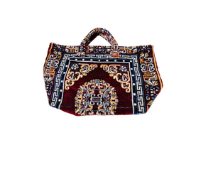 Decorative bag with intricate patterns on a white background