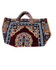 Decorative bag with intricate patterns on a white background