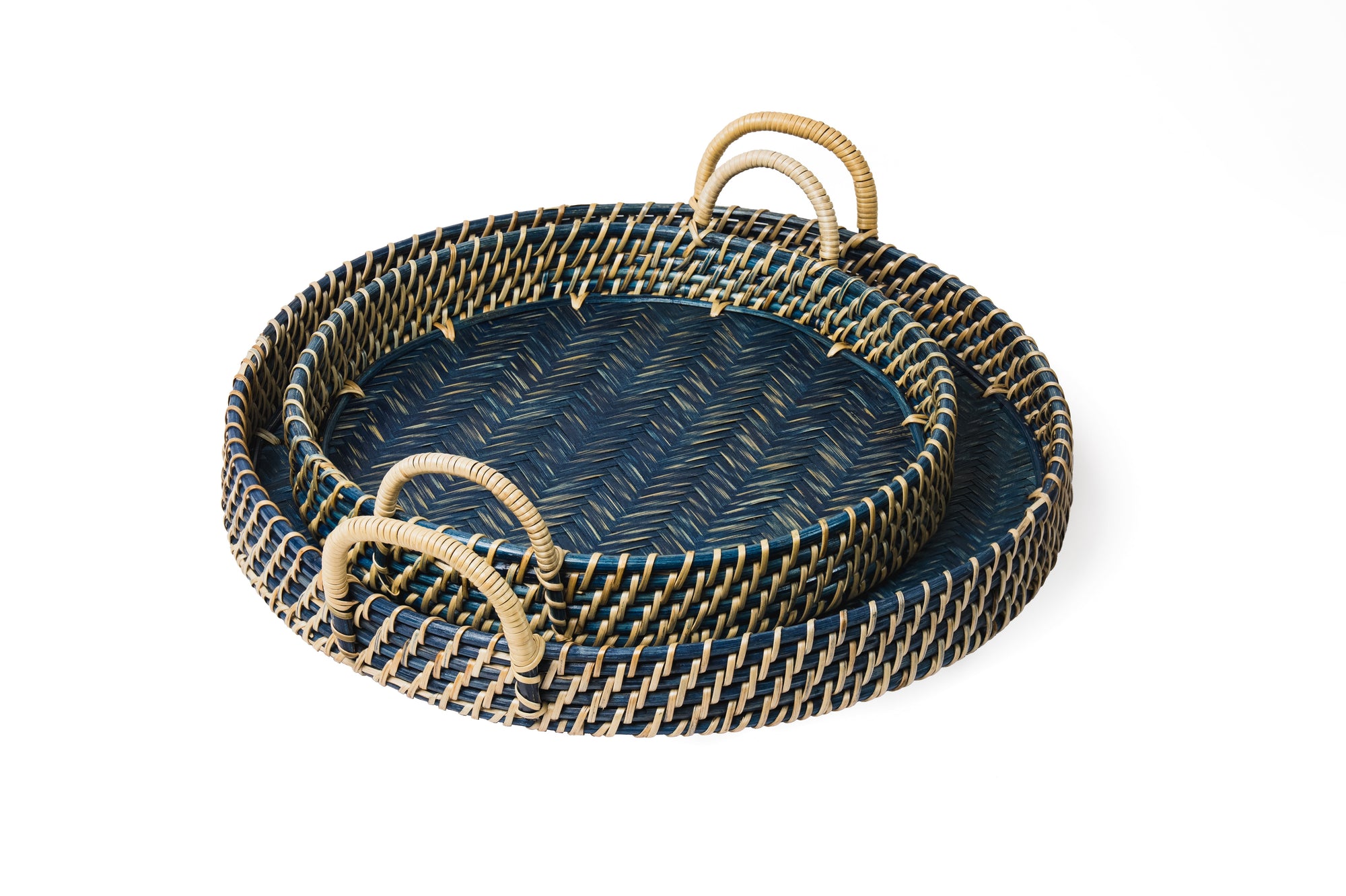 Set of two woven trays with handles on a white background