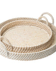 Set of two woven baskets with handles on a white background