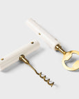 Corkscrew with marble handle on a light gray background