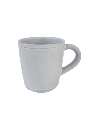White ceramic mug on a white background