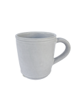White ceramic mug on a white background