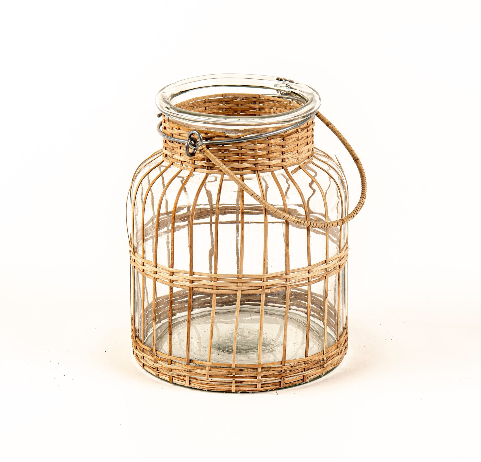 Wicker lantern with glass jar on a white background