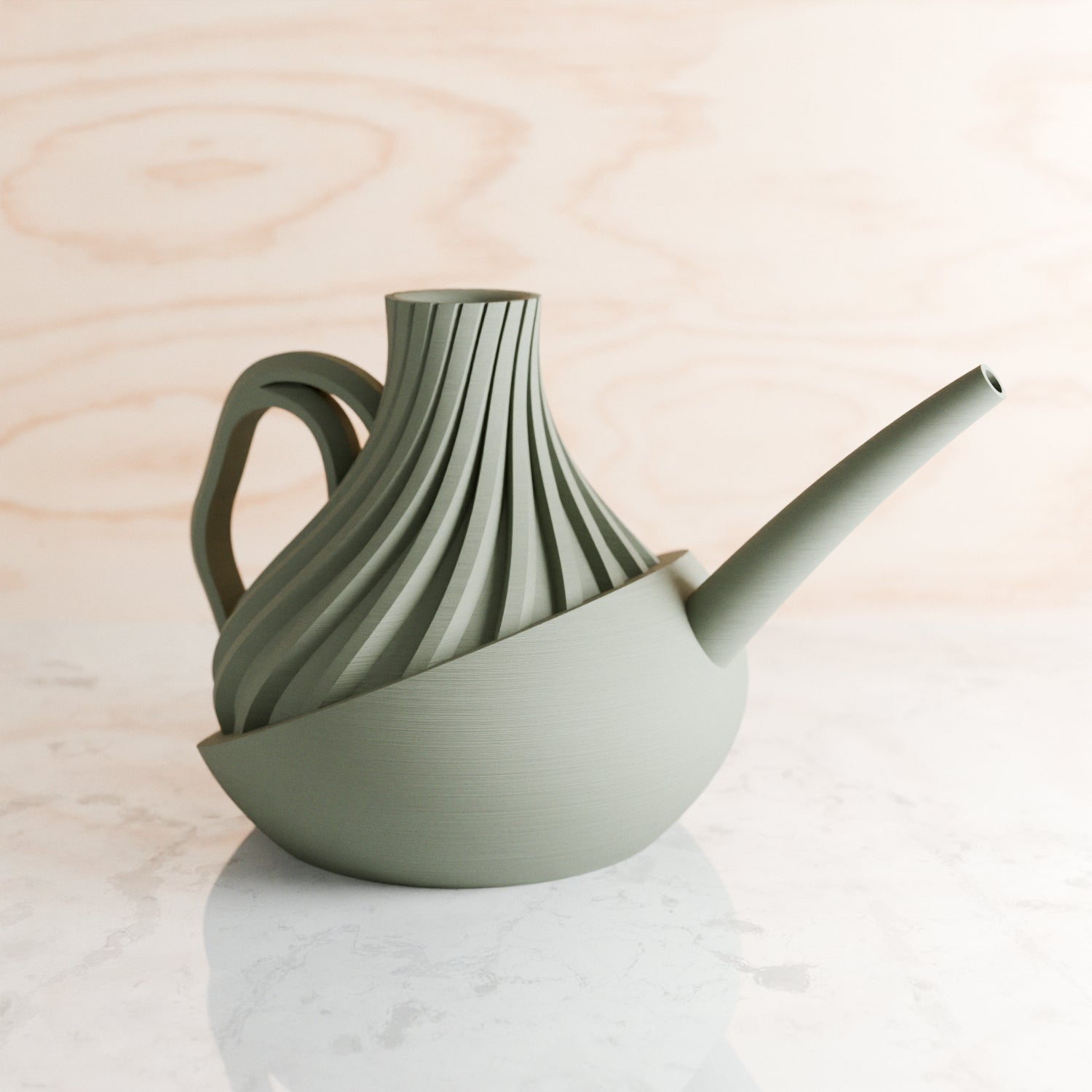 Green ceramic watering can with a textured design on a light wooden surface
