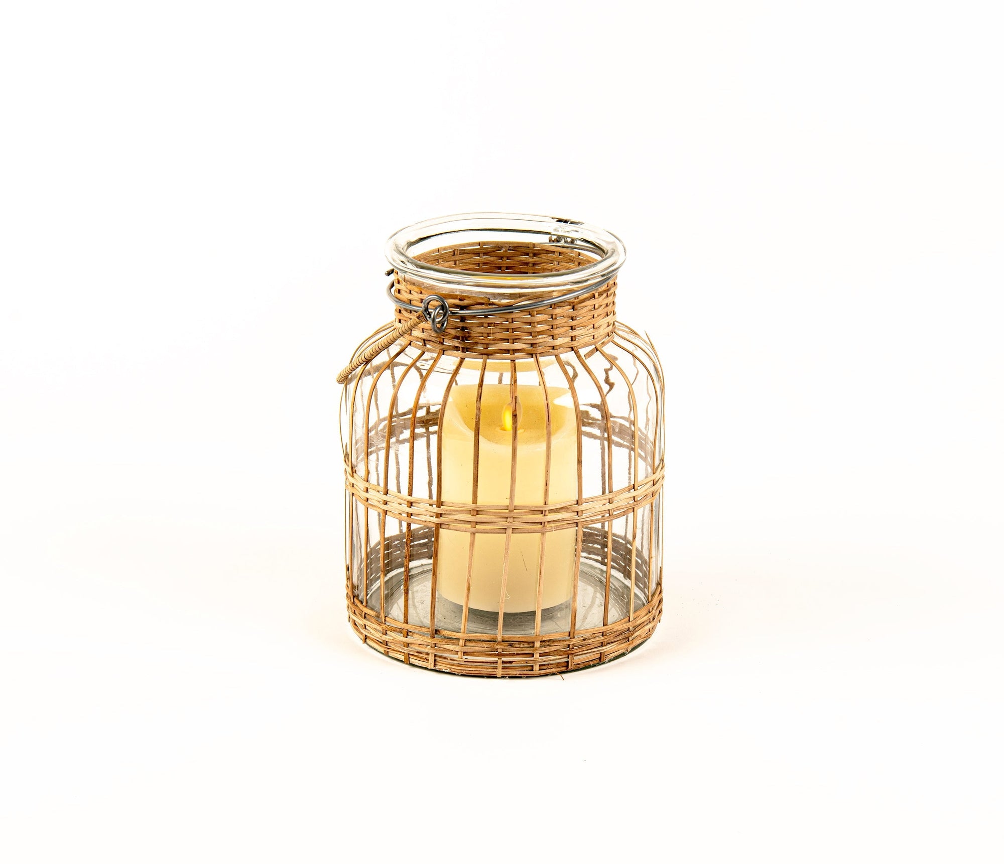 Wicker lantern with a candle inside on a white background