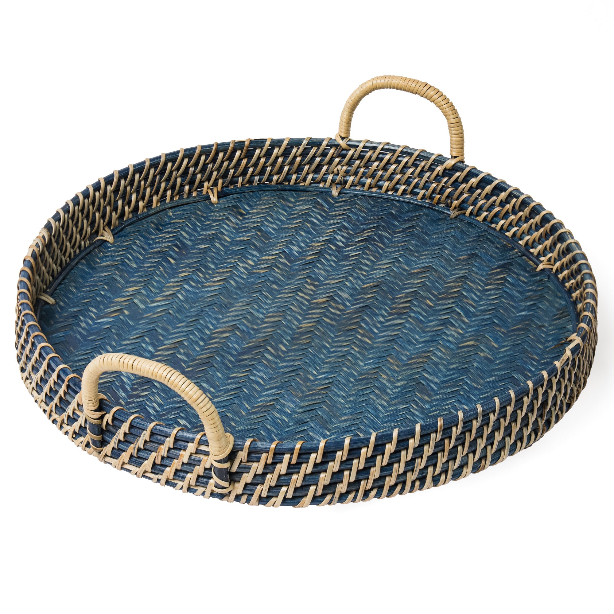 Round woven tray with blue center and natural handles on a white background