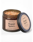Osmology Happy Space bath salts jar with pink Himalayan salt on a white background