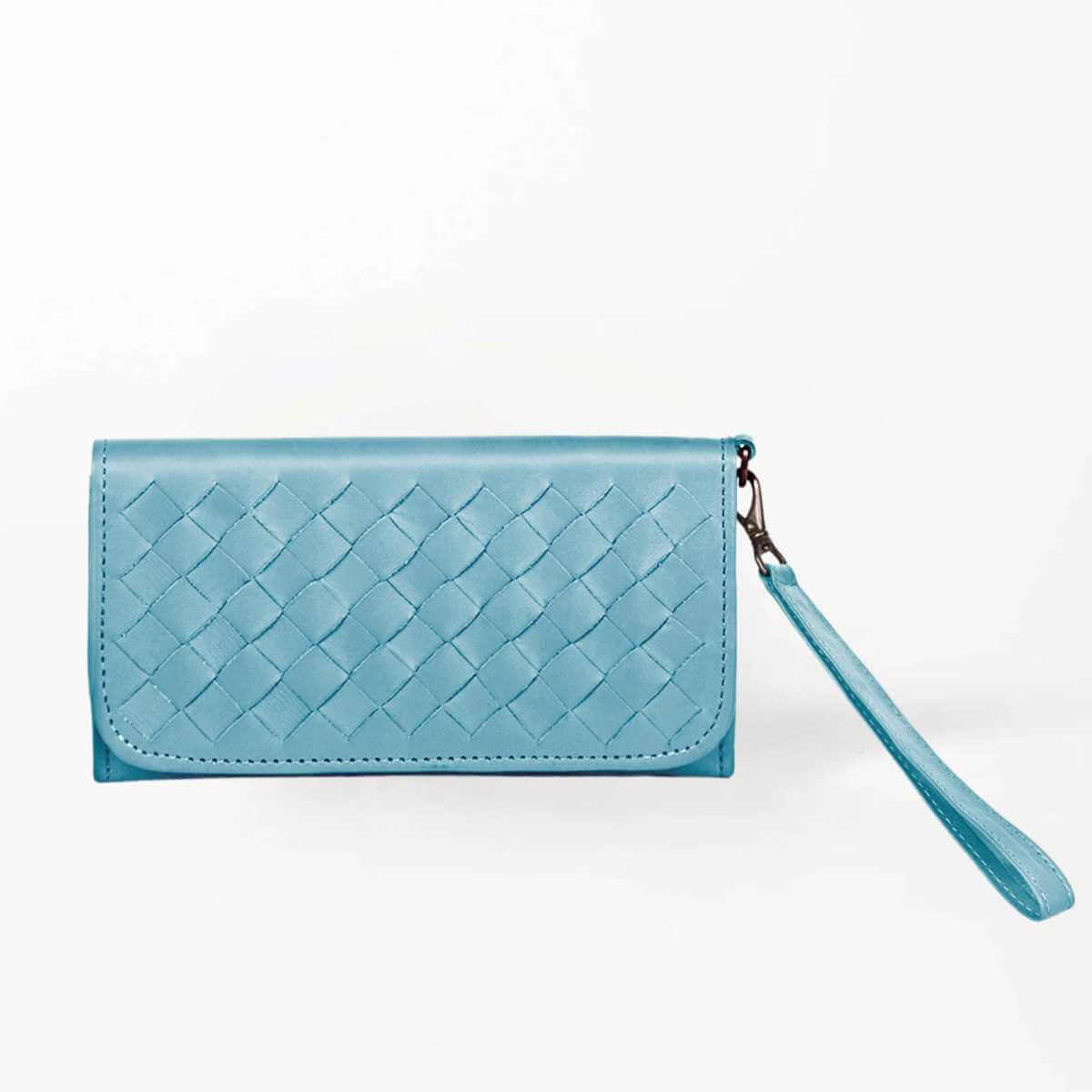 Blue woven wristlet wallet with a wrist strap on a white background