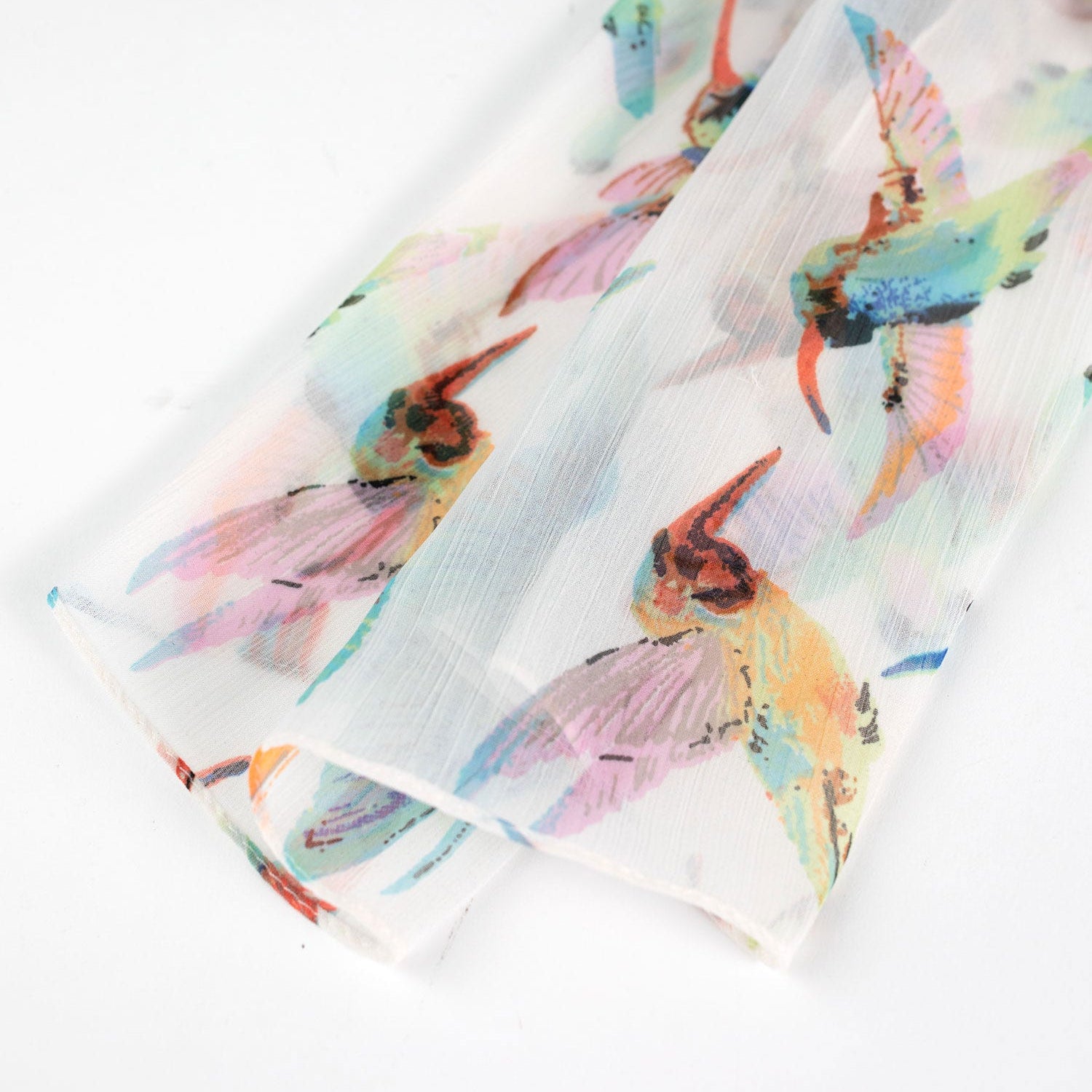 Scarf with colorful butterfly design on a white background