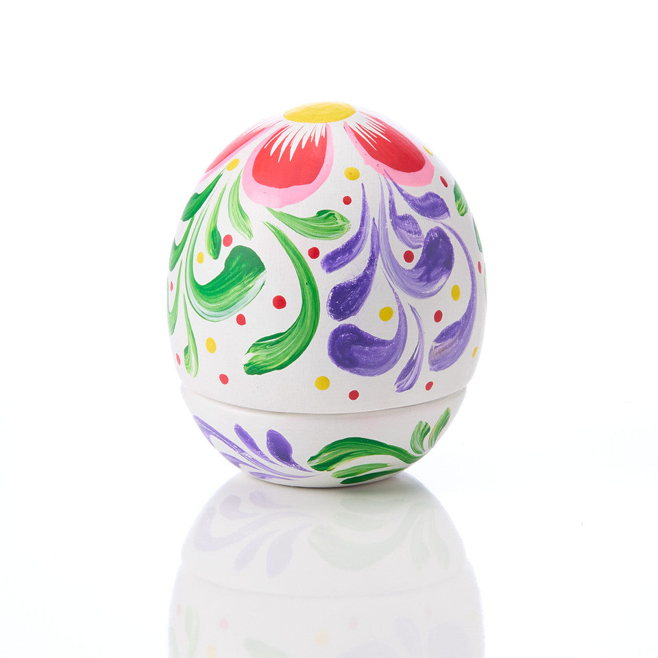 Colorful hand-painted egg on a white background