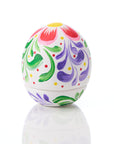 Colorful hand-painted egg on a white background